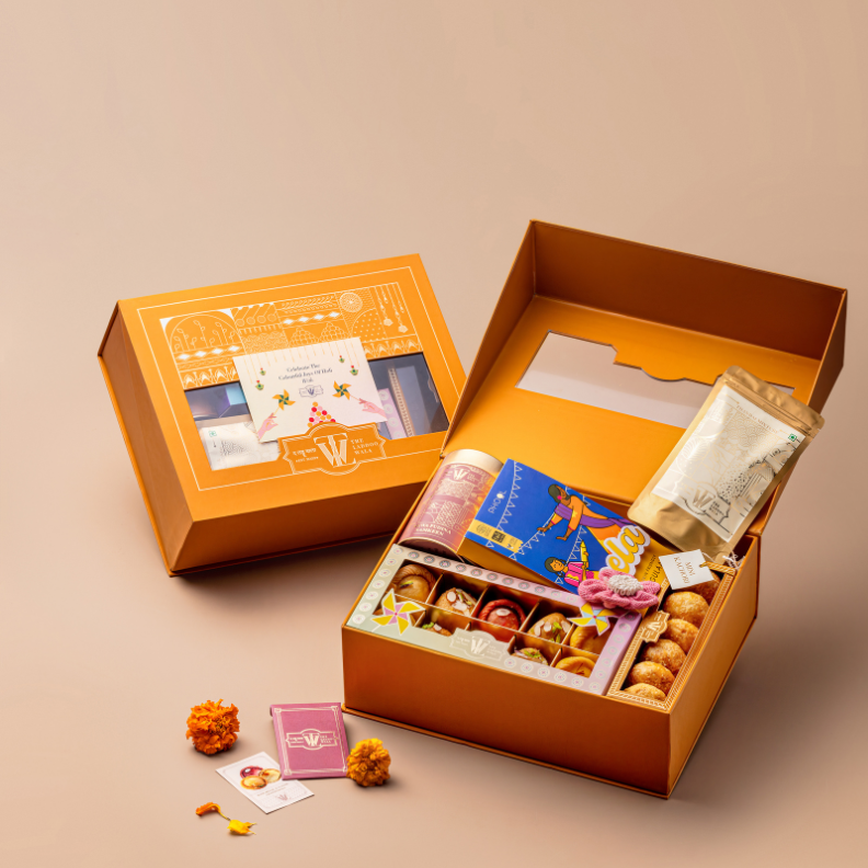 Gulaabo Holi hamper with assorted sweets, namkeen, thandai and organic gulaal